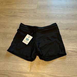 New medium swim shorts. Run small